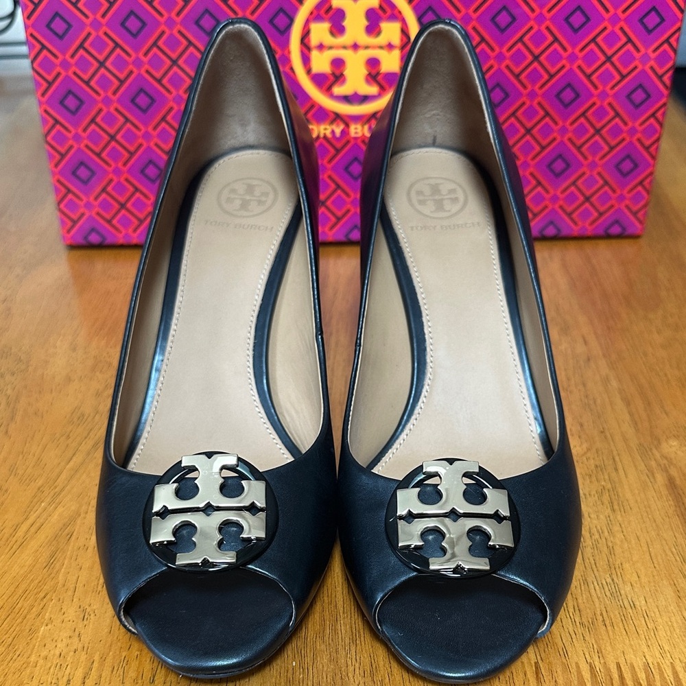 Tory Burch Black Peep-Toe Heels. Women’s size 7. Gold Tory Burch emblem on toe.